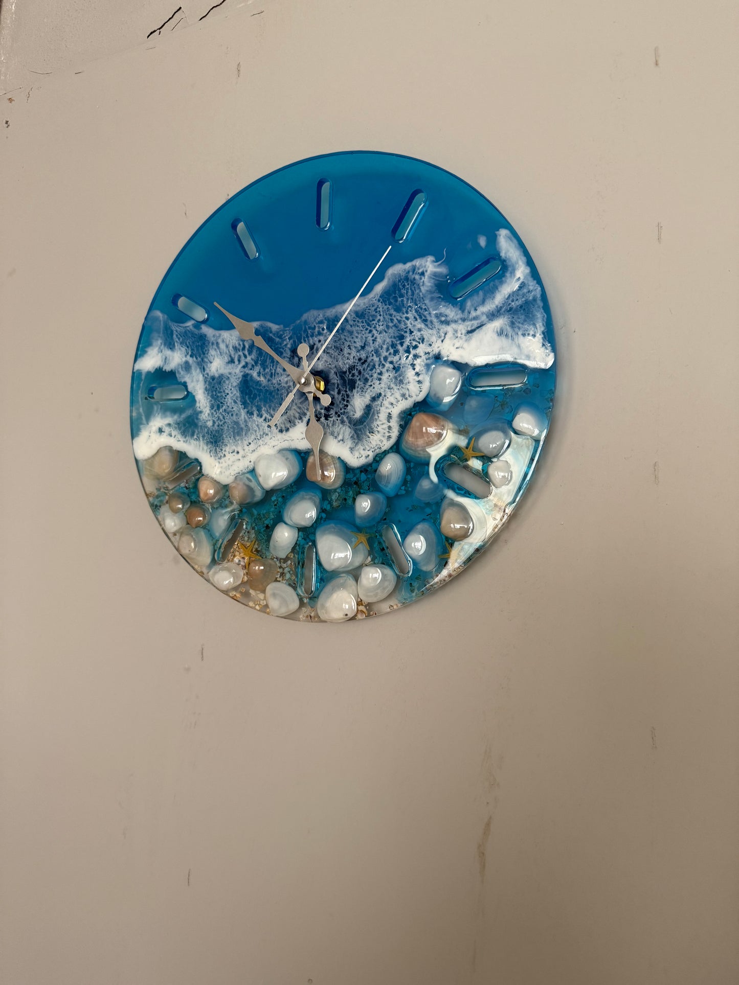 Deniz kabuğu duvar saati
