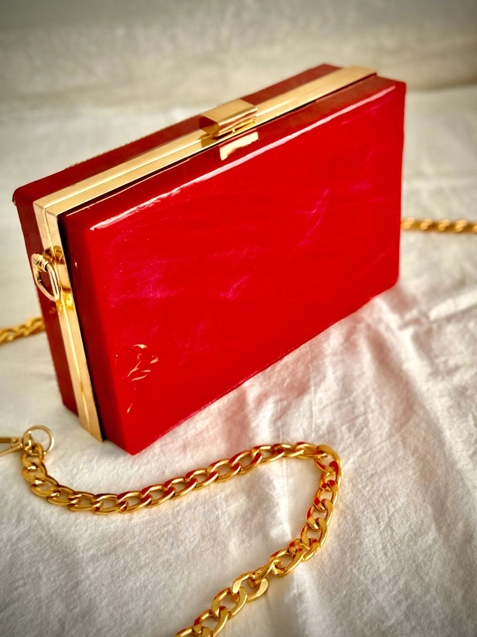 Swaraki taşlarla yapılmış debriyaj epoksi çanta - HediyeEpoxySwaraki taşlarla yapılmış debriyaj epoksi çantaHediyeEpoxySwaraki taşlarla yapılmış debriyaj epoksi çanta - HediyeEpoxy